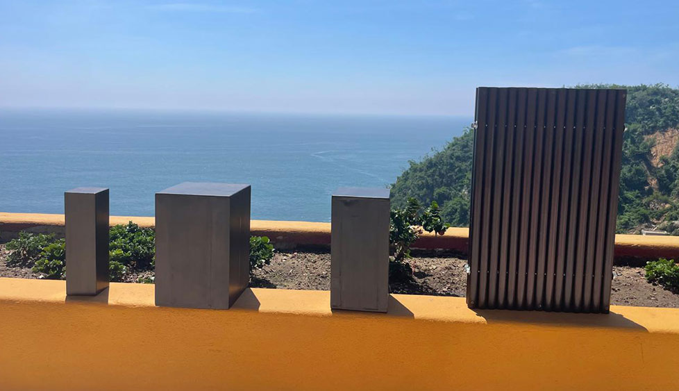 Terraza frente al mar con celosías de Prolen